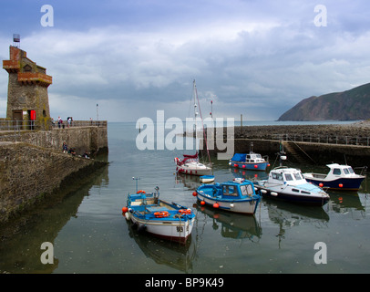 Fishing boats at the entrance to Lynton harbour on the north Devon coast Stock Photo