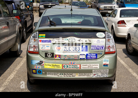 Toyota Prius hybrid car with many bumper stickers - USA Stock Photo