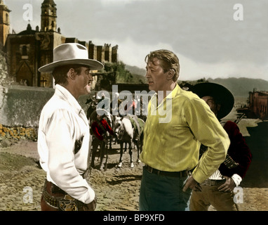 GILBERT ROLAND, ROBERT MITCHUM, BANDIDO, 1956 Stock Photo - Alamy