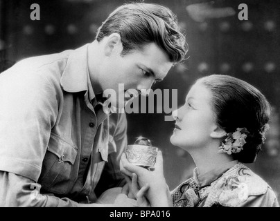 CHARLES STARRETT, MYRNA LOY, THE MASK OF FU MANCHU, 1932 Stock Photo