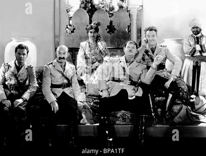 JAMES FINLAYSON, OLIVER HARDY, STAN LAUREL, BONNIE SCOTLAND, 1935 Stock Photo