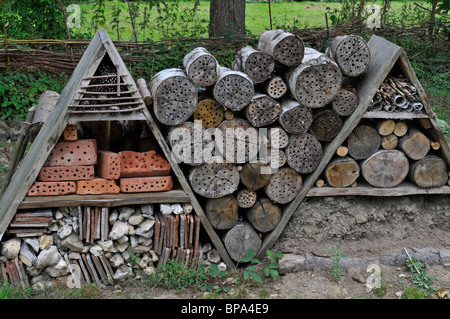 Bug hotel, Artificial nest holes and shelter for insects and invertebrates Stock Photo