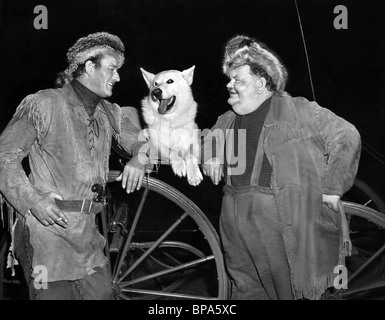 JOHN WAYNE, OLIVER HARDY, THE FIGHTING KENTUCKIAN, 1949 Stock Photo