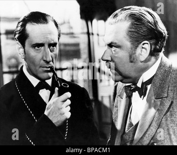 BASIL RATHBONE, NIGEL BRUCE, THE HOUND OF THE BASKERVILLES, 1939 Stock Photo