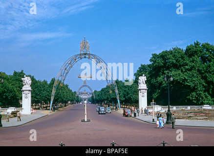 The Mall in London with the decorative arches still in place shortly after the Coronation of Elizabeth II on 2 June 1953 Stock Photo