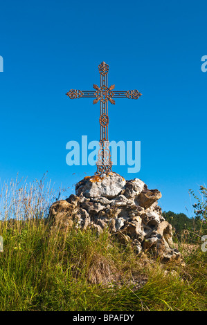 Roadside decorative wrought iron cross - France. Stock Photo