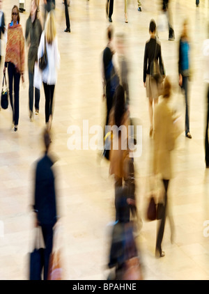 Crowd of People Rush Through Station Stock Photo