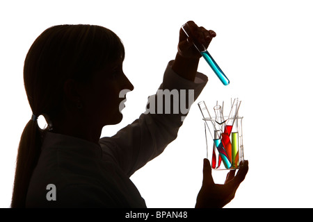 Laboratory assistants working in  a chemical laboratory. Working with different chemicals in test tubes. Stock Photo