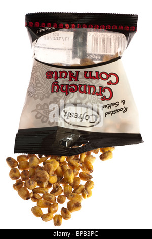 Bag of Cofresh roasted and salted crunchy corn nuts snack spilling onto a white surface Stock Photo