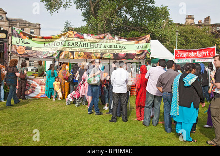 Multicultural queue at an Asian fast food stall (Karahi hut) at Edinburgh Mela, 2010 Stock Photo