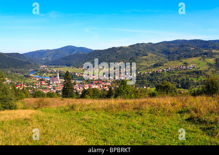 Panorama of small mountain town in polish carpathians. Stock Photo