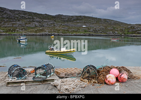 The Small sheltered Harbour at Ludag on the Southern tip of South Uist, Outer Hebrides, Scotland.  SCO 6392 Stock Photo