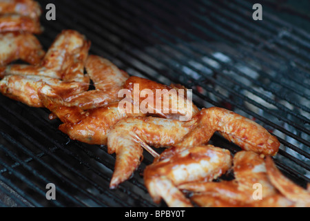 Bar-b-Que Chicken wings on a charcoal grill Stock Photo