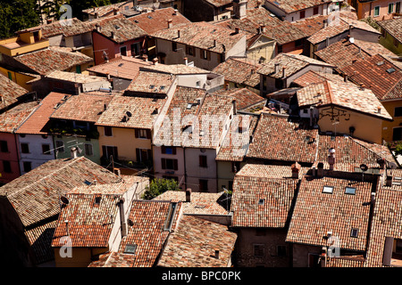 View over Lake Garda over the tiled roofs of Malcesine Stock Photo