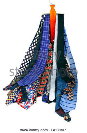 Coloured patterned and striped Silk Ties hanging up on a tie rack Stock Photo