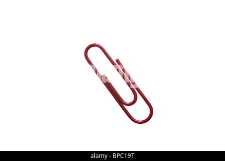 Metal red paper clip for business in office isolated on white background. Paperclip paper holder accessory. Stock Photo