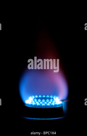 Gas burner with blue and pink flame Stock Photo