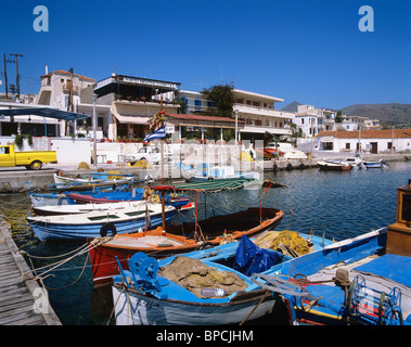 Tavernas and fish restaurants overlook the harbour in the picturesque fishing village of Perdika Stock Photo