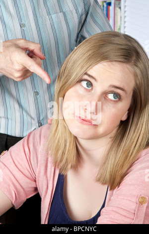 Parent Lecturing Apathetic Teenage Girl Stock Photo