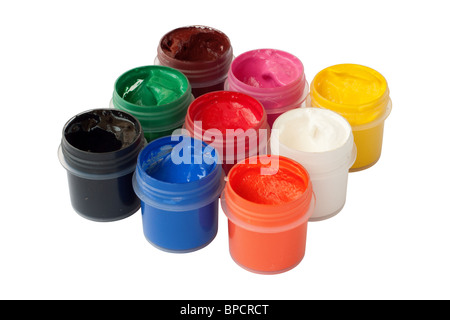 Jars with colored gouache. Isolated on white background with clipping path. Stock Photo
