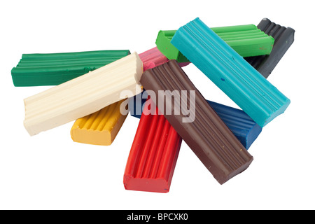 Heap of colored plasticine bricks. Isolated on white background with clipping path. Stock Photo