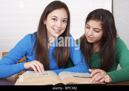 Teens doing homework Stock Photo