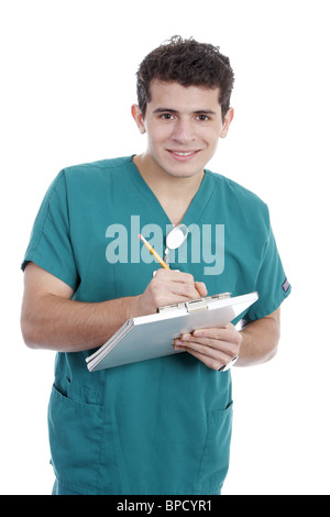 Male nurse filling out a patient chart Stock Photo