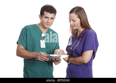 Nurses discussing patient chart