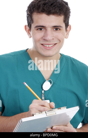 Male nurse filling out a patient chart Stock Photo