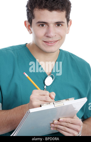 Male nurse filling out a patient chart Stock Photo