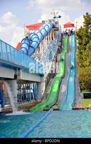 Water slide at Hurricane Harbor waterpark , Six Flags Over Texas amusement park, Arlington, TX, USA Stock Photo