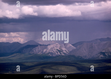 Yukon Territory, Canada - Dark Stormy Weather / Storm Clouds and Rain over Wernecke Mountains along Dempster Highway Stock Photo