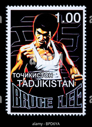 TADJIKISTAN - CIRCA 2000: A postage stamp printed in the Tadjikistan showing Bruce Lee, circa 2000 Stock Photo