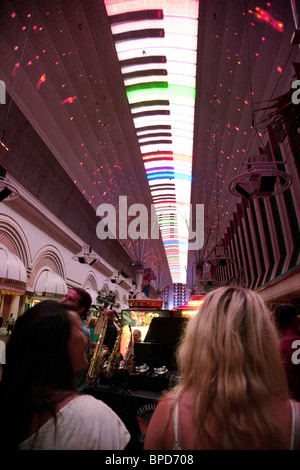 People enjoying the light show on the roof, Fremont Street, Downtown Las Vegas, Nevada Stock Photo