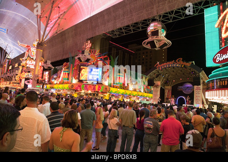 Crowds watching a live music show in the Fremont St Experience, Downtown Las Vegas Nevada USA Stock Photo