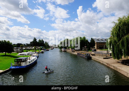 Man on a Pedalo on the River Great Ouse, Ely, Cambridgeshire, England, UK Stock Photo