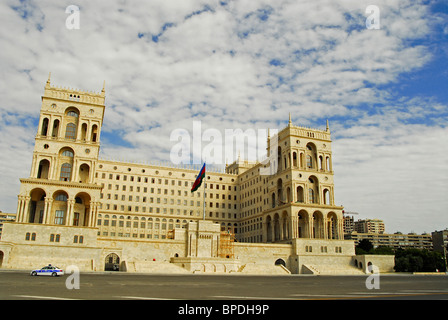 Baku, Azerbaijan, Imposing white presidential palace with the azeri flag floating in front of it, overlooking Baku Boulevard, a Stock Photo