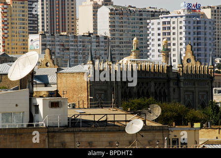 Azerbaijan, Baku, view of satellite dish attached with buildings in the background Stock Photo
