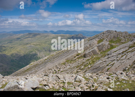 The Great Slab of Flat Crags on Bowfell, with the Langdale Pikes in the background - Lake District, Cumbria