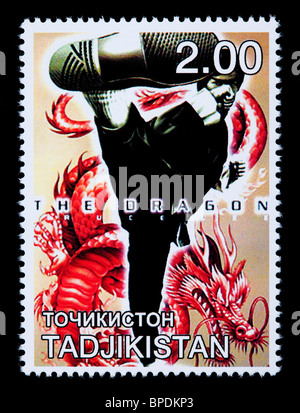 TADJIKISTAN - CIRCA 2000: A postage stamp printed in the Tadjikistan showing Bruce Lee, circa 2000 Stock Photo