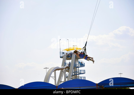 Sky coaster swing at Hurricane Harbor waterpark , Six Flags Over Texas amusement park, Arlington, TX, USA Stock Photo