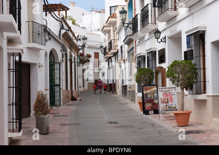 Very narrow street in Nerja Spain Stock Photo