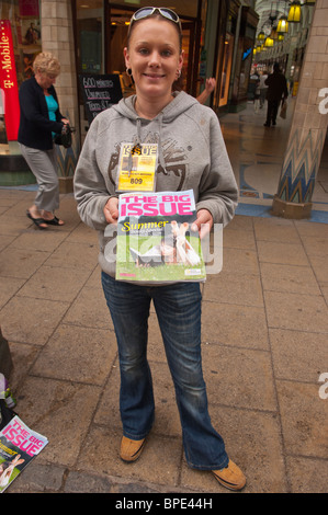 A female selling The Big Issue magazine in Norwich , Norfolk , England , Great Britain , Uk Stock Photo