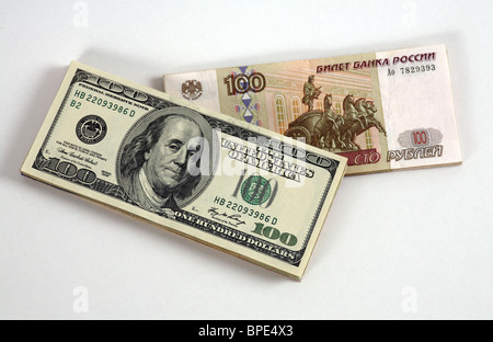 100-dollar and 100-ruble banknotes Stock Photo