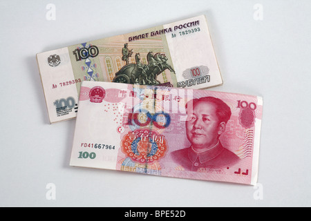 100-ruble and 100-renminbi yuan banknotes Stock Photo