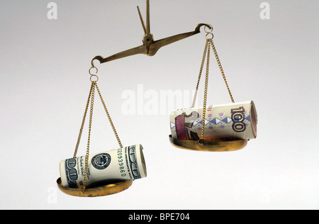 Dollar and ruble banknotes on scales Stock Photo