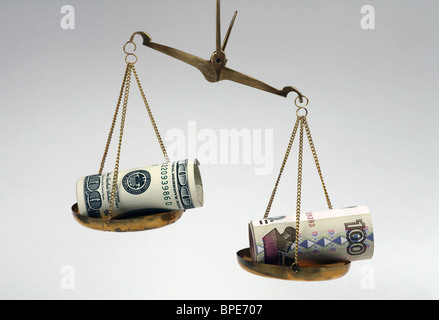 Dollar and ruble banknotes on scales Stock Photo