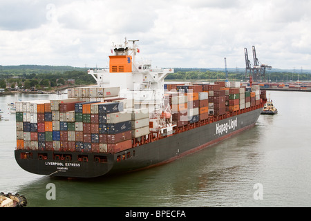 Container ship 'Liverpool Express' arriving Southampton Container berths Stock Photo