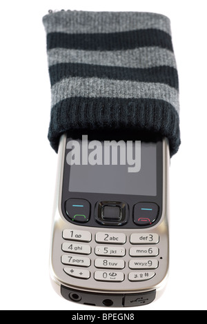 Silver grey mobile phone in a grey and black striped protective sock. Stock Photo