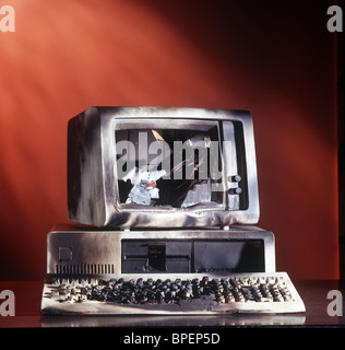 Computer PC keyboard all burnt black monitor smashed Stock Photo